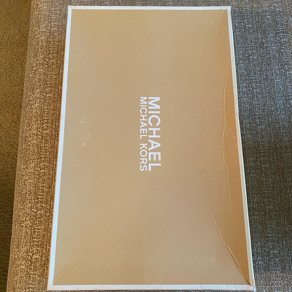 Woman’s Michael Kors dress boots.